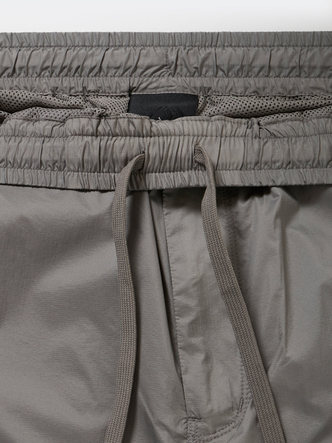 TECH WIND SHELL SHORTS